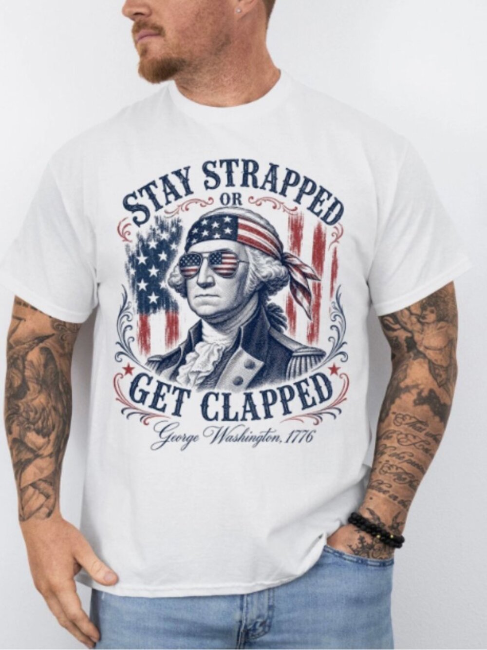 Geogre Washington Stay Strapped Or Get Clapped Patriotic Graphic T-Shirt